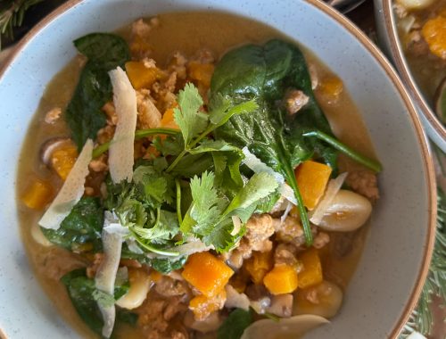 Bowl of Butternut Squash Gnocchi Soup with turkey sausage, kale, and herbs — a cozy fall recipe from Food Style Uncorked.